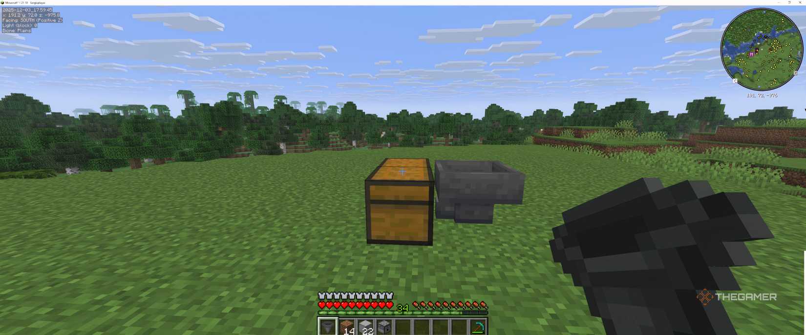 A close up of a dispenser going into a chest in Minecraft.