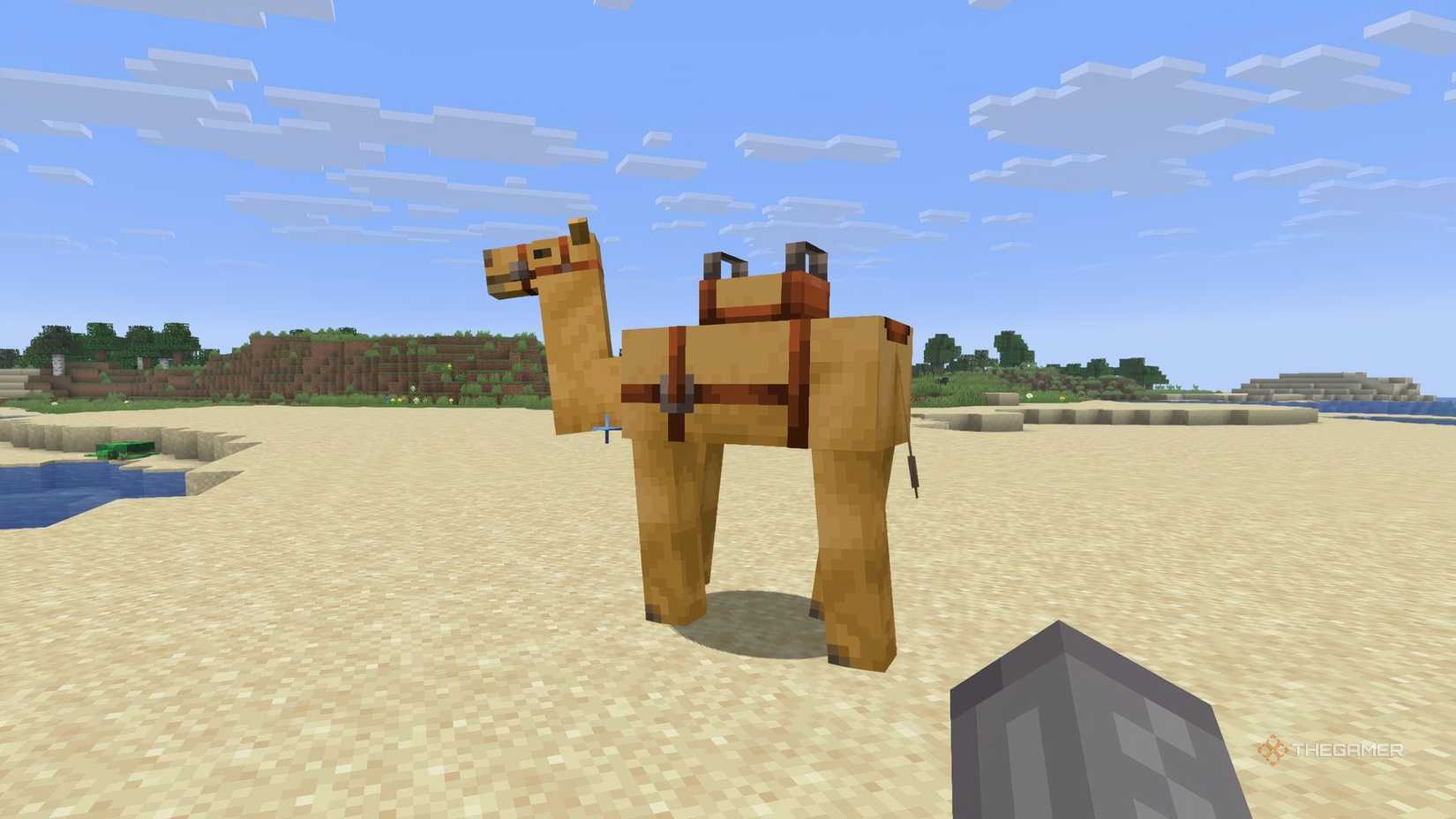 A Minecraft camel walking along the sand.