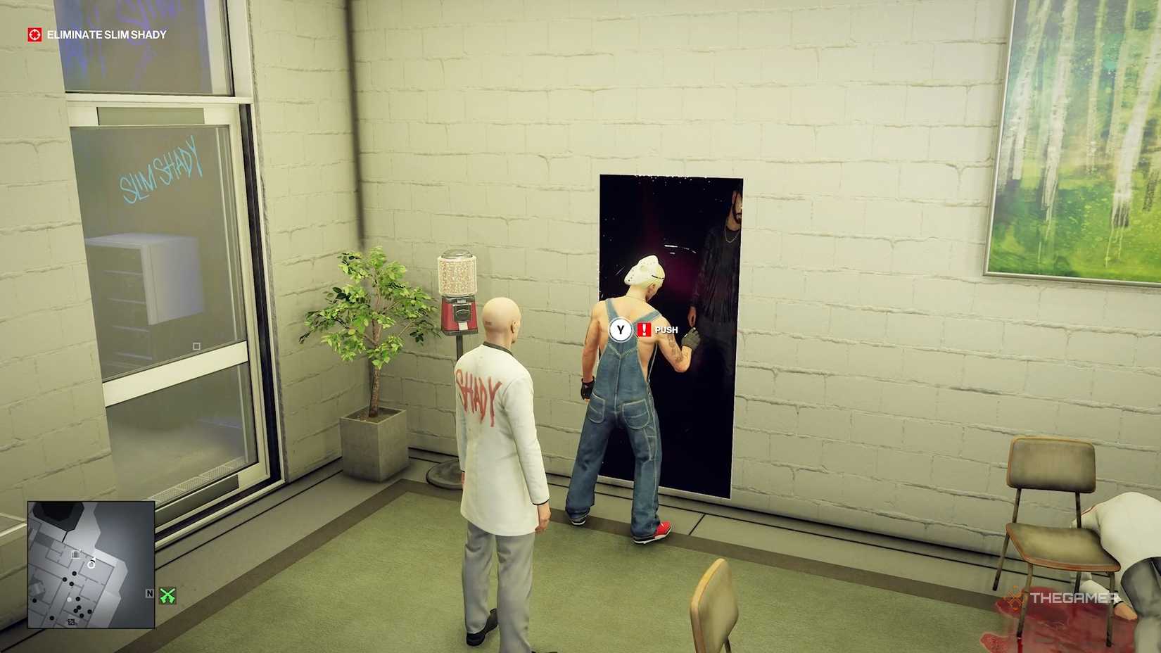 Agent 47 ready to push Slim shady into a mirror in Hitman World of Assassination.