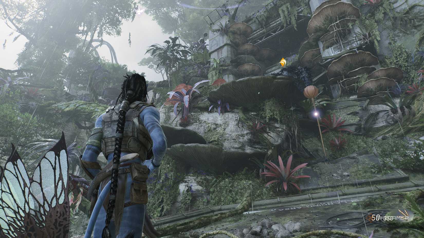 Avatar_ Frontiers of Pandora™ Standing below the entrance to the TAP facility in the forest.