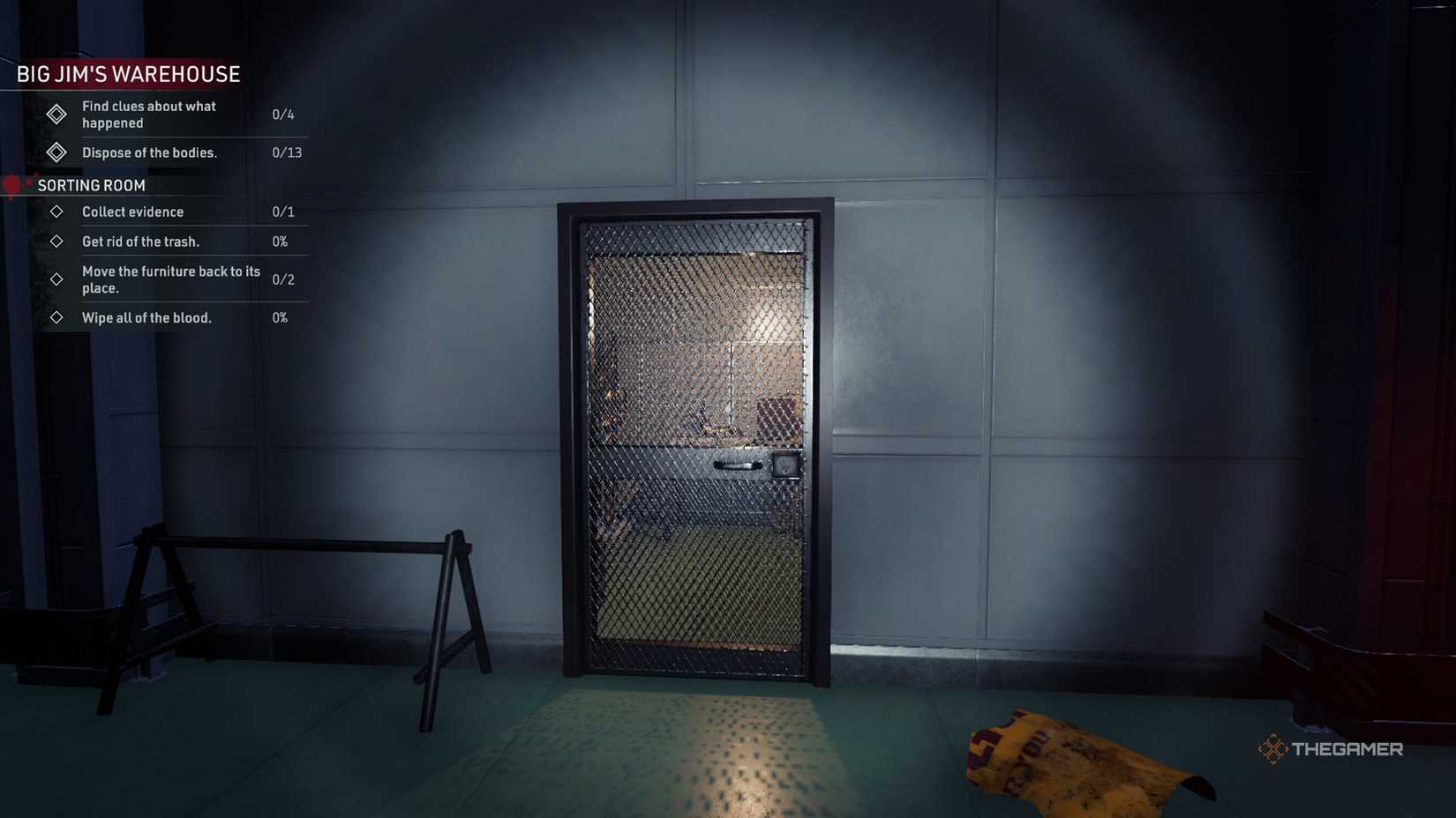 Kovalsky is in front of a wired door inside the sorting room in Crime Scene Cleaner.