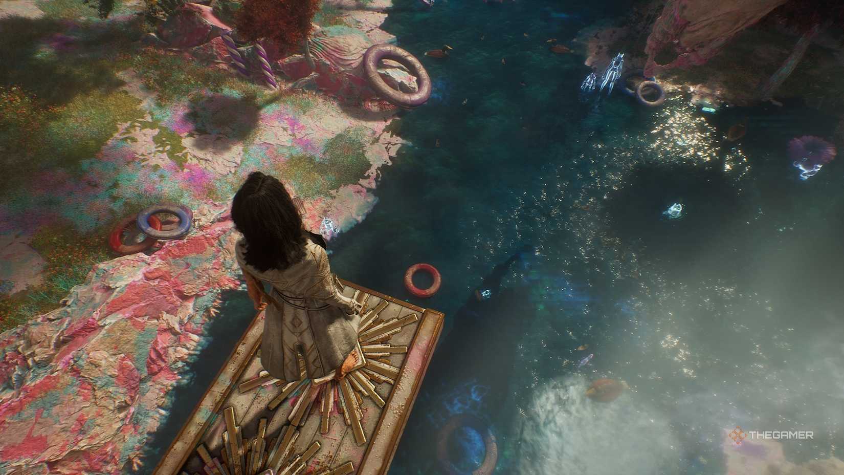 Lune on a diving board, looking down at a red hoop in Clair Obscur Expedition 33.