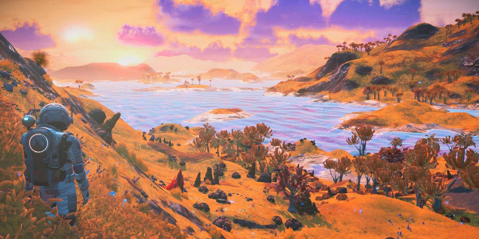 Player is overlooking the planet's cloudy sunset in No Man's Sky.