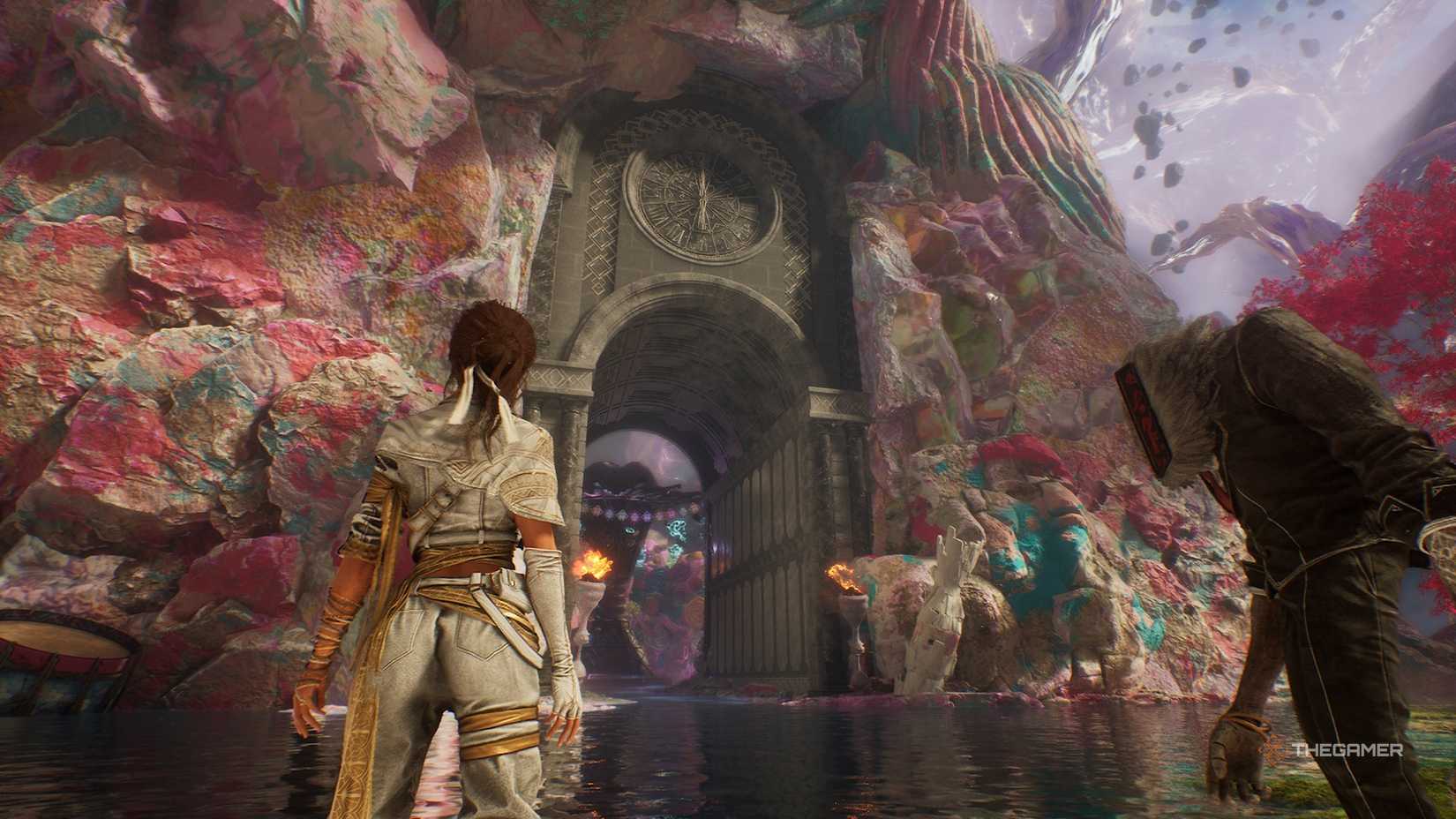 Sciel looking at a grey archway in Clair Obscur Expedition 33.