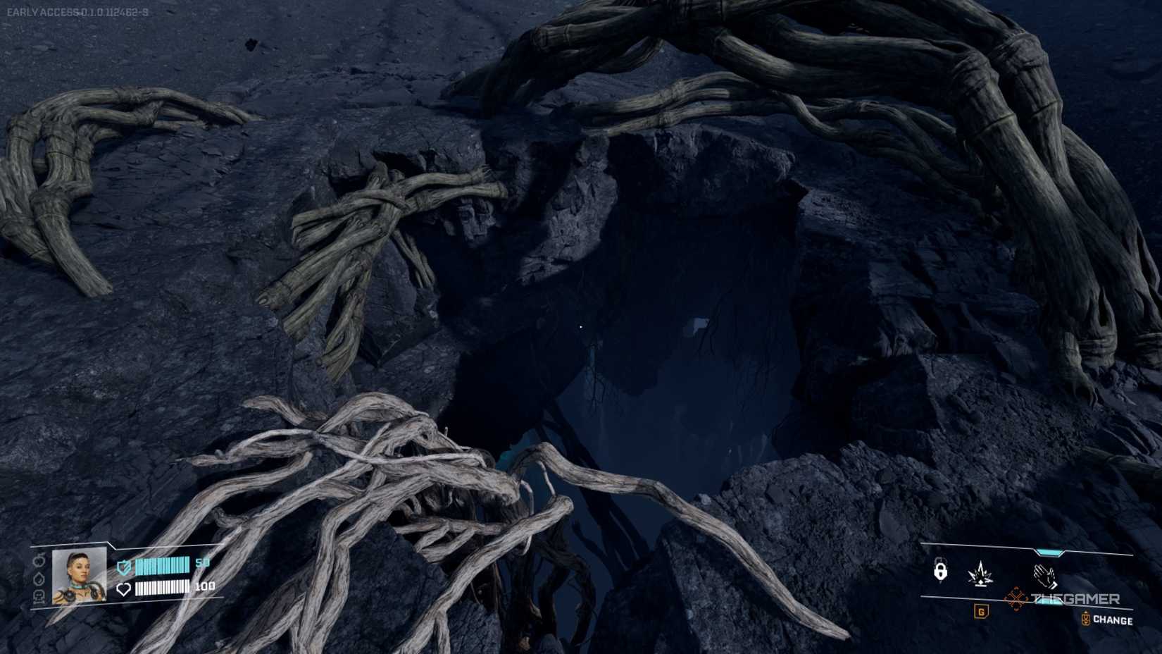 An open hole with vines in the darkness in StarRupture.